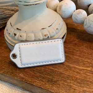 Coach white hang tag